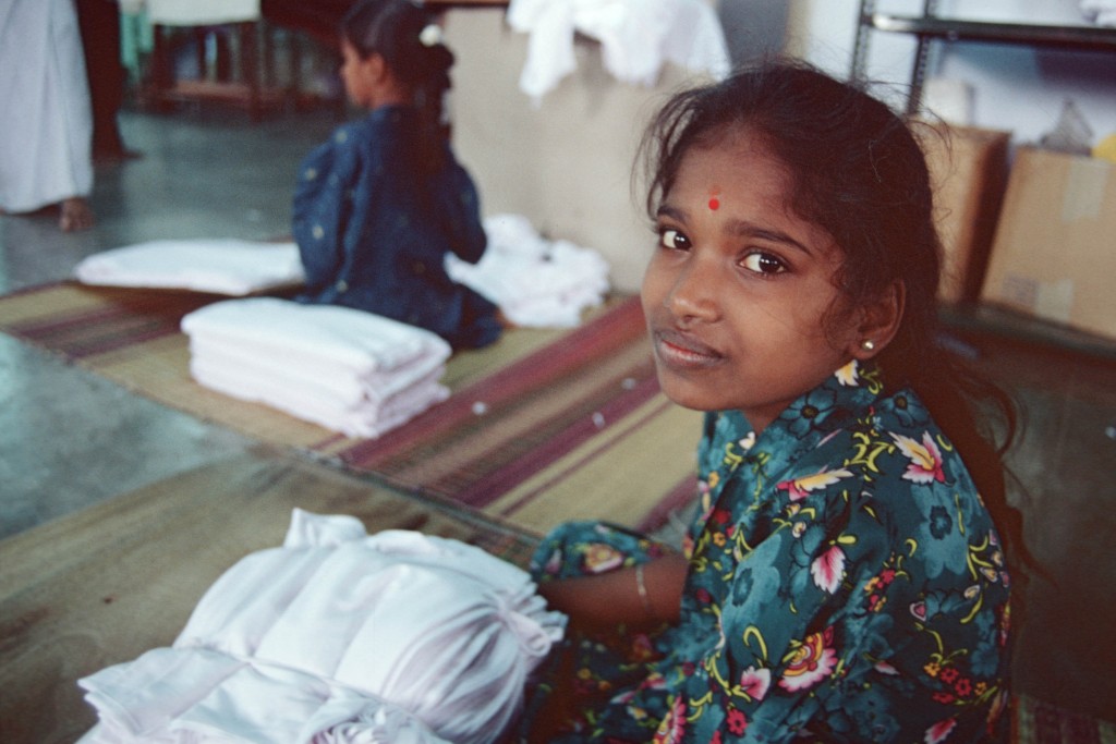 Girl folding cotton